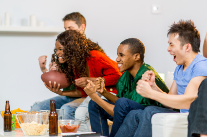 Young adults watching football
